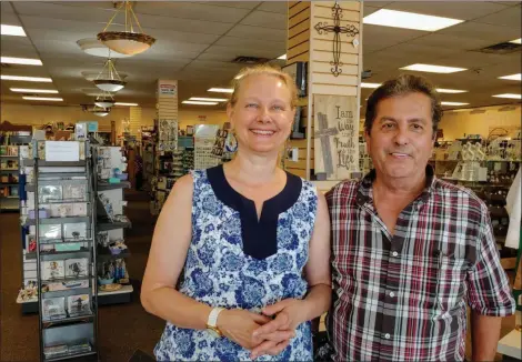  ?? BETSY SCOTT — THE NEWS-HERALD ?? Mosack’s owners Betty and Joe Vento pose in their new location at 7633 Mentor Ave.