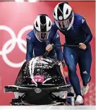  ?? CLIVE MASON ?? Mica Moore (left) in action for Great Britain during the Women’s Bobsleigh at the 2018 Winter Olympic Games in South Korea