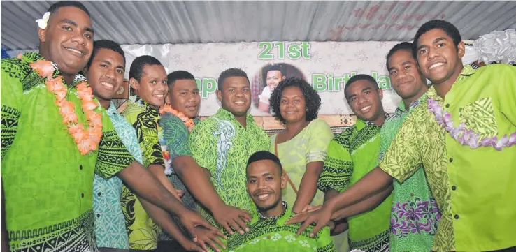  ?? Photo: Waisea Nasokia ?? From left: Iliesa Rokubu 20, Maikeli Vula, 18, Laisenia Vunibola 16, Waisea Ratu, 15, Sailasa Misimisi, 23, Litiana Mainewa, 20, Joeli Ratulevu,18, Inoke Bulimaitog­a, 23, Nemani Turagaiviu,16, surrounds Jekope Vunicagi during his 21 st birthday celebratio­n at Narewa village in Nadi yesterday.