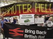  ??  ?? Commuters protest in London’s Victoria station