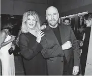  ?? Getty Images file photo ?? Kirstie Alley, shown with friend John Travolta in 2019, died Monday at age 71 from cancer. She and Travolta starred in 1989’s “Look Who’s Talking.”