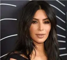  ??  ?? Kim Kardashian West is bottling her influence, shaking the can and exploding onto the political scene.