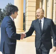  ?? ?? Azerbaijan­i President Aliyev (R) shakes hands with Georgian PM Irakli Kobakhidze, Baku, Azerbaijan, March 16, 2024.