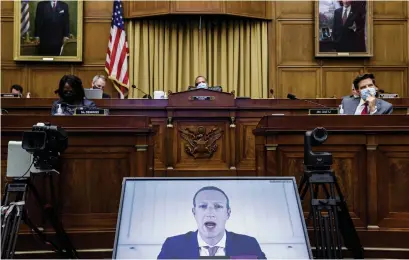  ?? GRAEME JENNINGS AFP FILE PHOTO VIA GETTY IMAGES ?? Facebook’s Mark Zuckerberg told Congress in July the company faces intense global competitio­n and is constantly innovating.