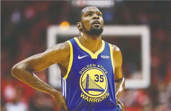  ??  ?? Four players on the Brooklyn Nets tested positive for COVID-19, including superstar Kevin Durant, out for the 2019-20 season with an injury.
TROY TAORMINA/USA TODAY SPORTS