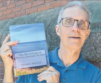  ?? SUBMITTED PHOTO ?? Selkirk Stories publisher John Westlie holds a copy of the revised edition of “The MacLeods of Prince Edward Island”. The book will be launched on Saturday, July 22, 2 p.m., at the Montague Rotary Library.