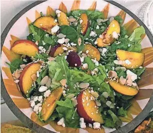  ??  ?? Peaches can be used in a multitude of dishes, including this simple peach salad.