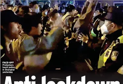  ?? ?? FACE-OFF Protesters taunt police in Shanghai yesterday