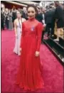  ?? PHOTO BY MATT SAYLES — INVISION —AP ?? Ruth Negga, wearing the ACLU ribbon, arrives at the Oscars on Sunday at the Dolby Theatre in Los Angeles.