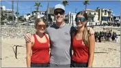  ?? COURTESY OF PATRICK LYNCH ?? Palos Verdes girls beach volleyball players Molly LaBreche, left, and Mallory LeBreche with their coach Patrick Lynch after winning Monday's Bay League pairs title.