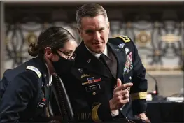  ?? ANNA MONEYMAKER — THE NEW YORK TIMES ?? Special Operations Command Gen. Richard Clarke speaks to his staff during a hearing to examine U.S. Special Operations Command and U.S. Cyber Command on Capitol Hill in Washington on Thursday.