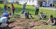  ?? ERIC MCCARTHY/JOURNAL PIONEER ?? Making sure weeds don’t stand a chance in this flowerbed at the Alberton Arts and Heritage Centre are, from left, Maria Lynch, Kylee Doucette, Alex DesRoche, Raelene Gallant, Tyscen Acorn, Haley Gallant, Ben Smallman, Nicole Smith and Jessica Gillis....