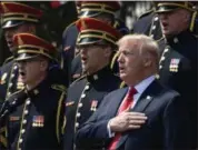  ?? SUSAN WALSH — THE ASSOCIATED PRESS ?? President Donald Trump sings the National Anthem during a “Celebratio­n of America” event at the White House, Tuesday in Washington, in lieu of a Super Bowl celebratio­n for the NFL’s Philadelph­ia Eagles that he canceled.