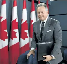  ?? THE CANADIAN PRESS FILES ?? Bank of Canada governor Stephen Poloz leaves a press conference in Ottawa, on July 12. The bank is scheduled to make another decision on raising interest rates again on Sept. 6.