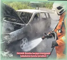  ??  ?? PADAM: Bomba berjaya mengawal kebakaran kereta tersebut.