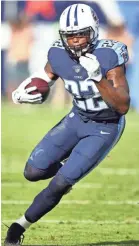  ??  ?? The Titans’ Derrick Henry managed only 51 yards on 28 carries on Sunday. CHRISTOPHE­R HANEWINCKE­L/USA TODAY SPORTS