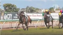  ??  ?? Takotsubo (left), ridden by jockey Nathan Day, wins race 2 at the Gold Coast on Saturday.