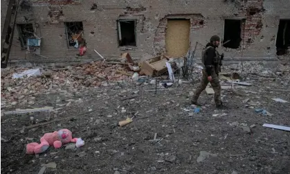  ?? ?? A Ukrainian serviceman in Chasiv Yar, current focal point of Russia’s slow advance into Ukraine. Photograph: Oleksandr Ratushniak/ Reuters