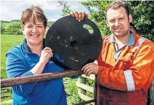  ?? Picture: Steve Brown. ?? June Geyer with son Hamish and one of the weights.