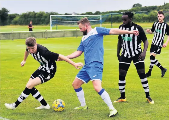  ?? Picture: Dan Regan ?? Action from Chipping Sodbury’s Toolstatio­n League 2-1 victory over Cribbs Causeway, in blue, last weekend