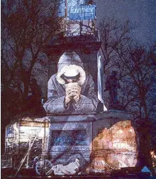  ??  ?? “The Homeless projection” by Krzysztof Wodiczko,an outdoor slide projection at the Soldiers and Sailors Civil War Memorial in Boston.