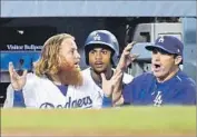  ?? Wally Skalij Los Angeles Times ?? THIRD BASEMAN Justin Turner, left, reacts after being ejected from a Sept. 6 game the Dodgers lost.