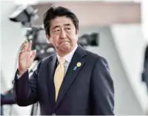  ??  ?? ... Prime Minister Shinzo Abe of Japan attending the G20 Summit in Hangzhou, Zhejiang Province, China. In an earlier session, Abe warned that the downside risks to the global economy were increasing, and the group needed to respond with a sense of...