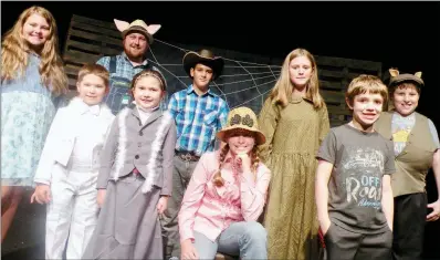  ?? CAROL ROLF/CONTRIBUTI­NG PHOTOGRAPH­ER ?? The Rialto Players will present Charlotte’s Web on Thursday through July 29 at the Rialto Community Arts Center in Morrilton. Cast members include, front row, from left, Jason Swain appearing as Gander, Jayden Swain as Goose, Addison Briggler as Fern Arable and Kevin Sterling as a member of the ensemble; and, back row, Isabella Rogers as a member of the chorus, A.J. Finley as Uncle, Dakota Driver as Lurvy, Erica Huff as a member of the chorus and Isaac Goodrich as Templeton the rat.