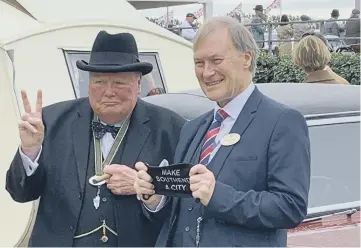  ?? ?? Visitors donned period dress for Goodwood Revival, including dressing as Winston Churchill