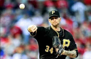  ?? Bill Boyce/Associated Press ?? Pirates starter A.J. Burnett throws to first base Friday against the Cardinals at Busch Stadium in St. Louis.