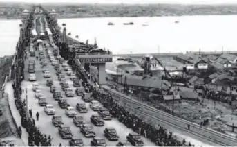 ??  ?? October 1957: The Wuhan Yangtze River Bridge opens to traffic. It is the first bridge to cross the Yangtze River. by Li Lanying and Li Jilu