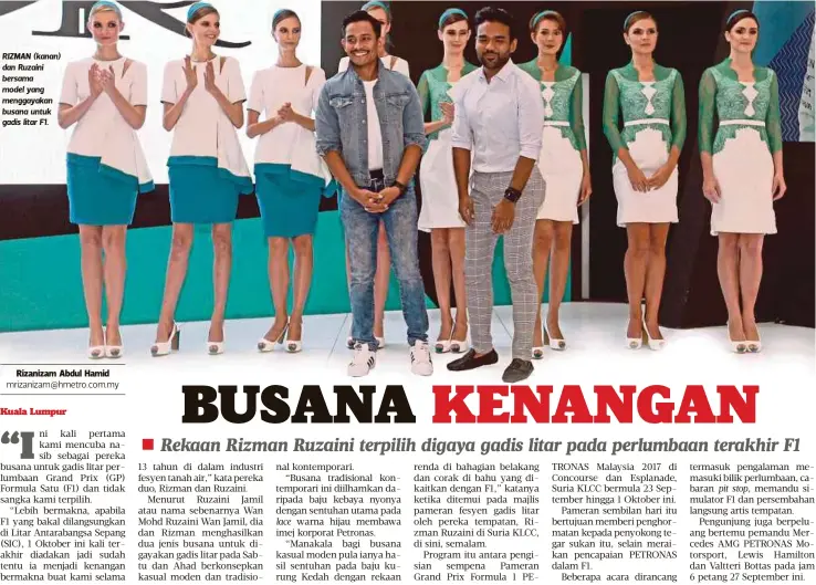  ??  ?? RIZMAN (kanan) dan Ruzaini bersama model yang menggayaka­n busana untuk gadis litar F1.