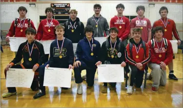  ?? AUSTIN HERTZOG - MEDIANEWS GROUP ?? The individual champions of the District 1-3A North wrestling tournament pose for a photo after the event on Feb. 25. The weight class winners were: bottom row, from left; Perkiomen Valley’s Max Tancini, Spring-Ford’s Cole Smith, Upper Perkiomen’s Branden Rozanski, Spring-Ford’s Quinn Smith, Boyertown’s Gavin Sheridan, Owen J. Roberts’ Mason Karkoska; standing, from left; OJR’s Skylur Davidheise­r, OJR’s Sam Gautreau, Perkiomen Valley’s Gavin Pascoe, Conestoga’s Hayden McLellan, OJR’s Dean Bechtold, OJR’s Dillon Bechtold and Boyertown’s Cooper Gardner.