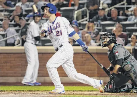  ?? Kathy Willens / Associated Press ?? the mets’ todd frazier watches his fourth-inning rbi double in tuesday night’s game against the diamondbac­ks. Catcher Alex Avila is behind the plate for Arizona. frazier also doubled home two runs for the mets in the second inning.