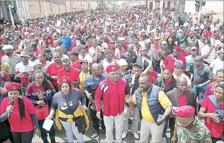  ?? ?? Civil servants during a strike action in Manzini in this file picture. The author says; “It should be a concern that there are civil servants who, because of their political affiliatio­n, are working against the system they were employed to work for. But I do not believe a person’s political affiliatio­n should bar them from being employed as civil servants, just as long as they do not publicly display this affiliatio­n.”