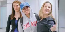  ?? — Reuters ?? Rahaf Mohammed al Qunun accompanie­d by Canadian Minister of Foreign Affairs Chryistia Freeland, arrives at Toronto Pearson Internatio­nal Airport in Toronto.