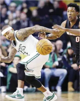  ??  ?? BOSTON: Miami Heat guard Josh Richardson (0) steals the ball from Boston Celtics guard Isaiah Thomas (4) in the second half of an NBA basketball game, Friday, in Boston. —AP