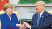  ?? REUTERS ?? US President Donald Trump welcomes German Chancellor Angela Merkel at the White House on Friday.