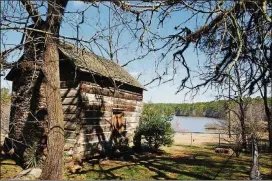  ?? AJC FILE PHOTO 2002 ?? In this file photo taken at Fort Yargo State Park, a 1,814-acre park located in Winder, you can see the Fort Yargo cabin, built in 1792 and the structure that bears the park’s name.