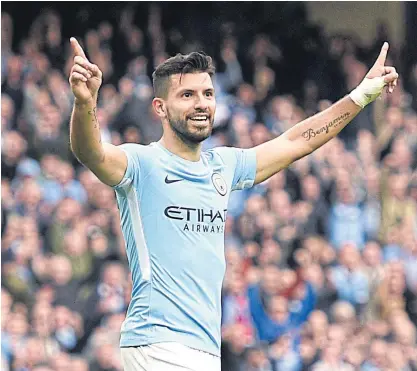  ??  ?? Manchester City striker Sergio Aguero celebrates a goal during a recent match.