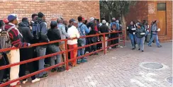  ??  ?? UJ students at Kingsway Campus wait in line to receive their lunch, above. Wits University’s main garden that is used to grow food for students, below.