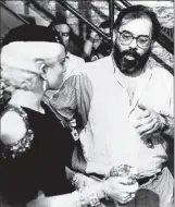  ?? Courtesy NYS Writers Institute ?? Actor Diane Lane and director Francis Ford Coppola discuss a scene during the filming of “The Cotton Club.”