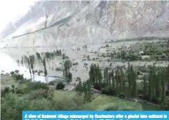  ?? — Reuters ?? A view of Badswat village submerged by floodwater­s after a glacial lake outburst in Gilgit-Baltistan province in Pakistan on July 27, 2018.