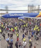  ?? BOEING ?? Boeing employees celebrate the 10,000th 737 jet to come off the assembly line.