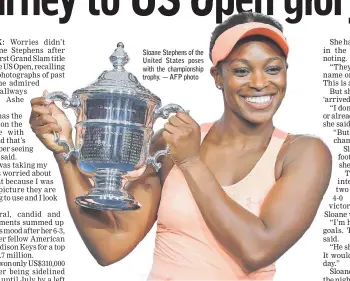  ??  ?? Sloane Stephens of the United States poses with the championsh­ip trophy. — AFP photo