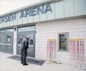  ?? JONATHAN HAYWARD THE CANADIAN PRESS ?? Hockey sticks are lined up at the Elgar Petersen Arena in Humboldt, Sask., in tribute to the 16 Humboldt Broncos players and team staff members who died after a bus crash in April.