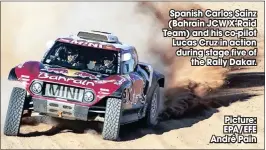  ?? Picture: EPA/EFE André Pain ?? Spanish Carlos Sainz (Bahrain JCW X-raid Team) and his co-pilot Lucas Cruz in action during stage five of
the Rally Dakar.