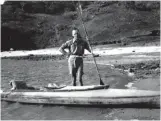  ??  ?? The inspiratio­n for Sandy’s epic journey, Oskar Speck, poses with his folding kayak during the expedition from Germany to Australia in the 1930s.