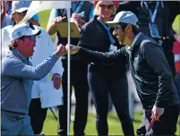  ?? DOUG DURAN — BAY AREA NEWS GROUP ?? Country music artist Clay Walker and actor and comedian Ray Romano celebrate during the AT&T Pebble Beach Pro-Am’s 3M Celebrity Challenge in 2020.