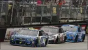  ?? WADE PAYNE — THE ASSOCIATED PRESS ?? Driver Jimmie Johnson (48) leads Kevin Harvick (4) and Kyle Larson (42) during a NASCAR Monster Energy NASCAR Cup Series auto race, Monday, in Bristol, Tenn.